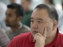 Undergraduate Student Listening to Professor
