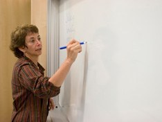 Linda Trevino Writing On Blackboard