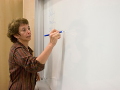 Linda Trevino Writing On Blackboard